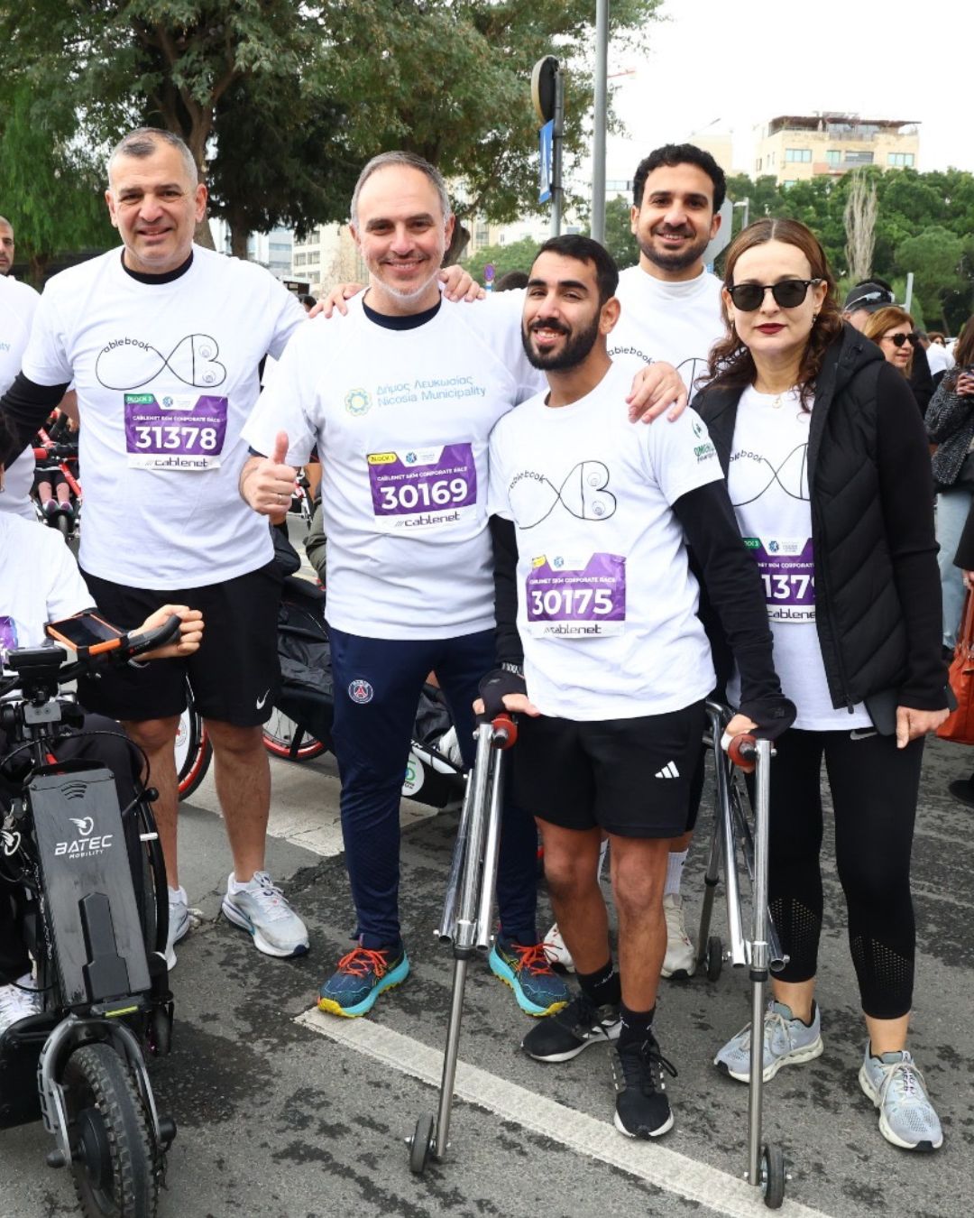 Infocredit team participating in the Bank of Cyprus Nicosia Marathon supporting inclusion and accessibility
