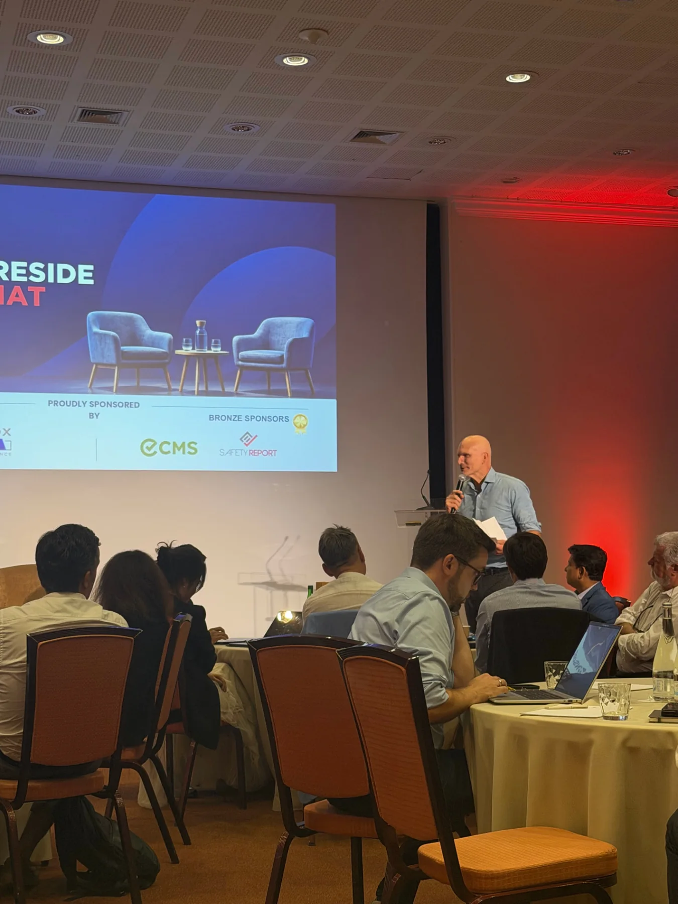 A speaker addressing delegates at the FEBIS General Assembly 2026 in Algarve.